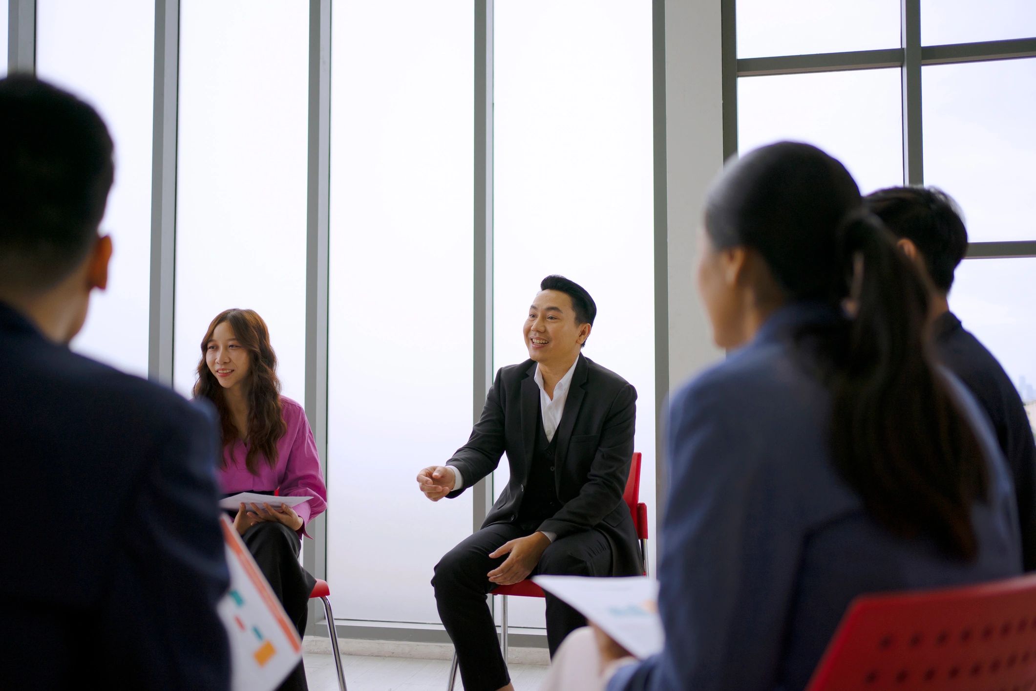 Mentorship team meeting around a table