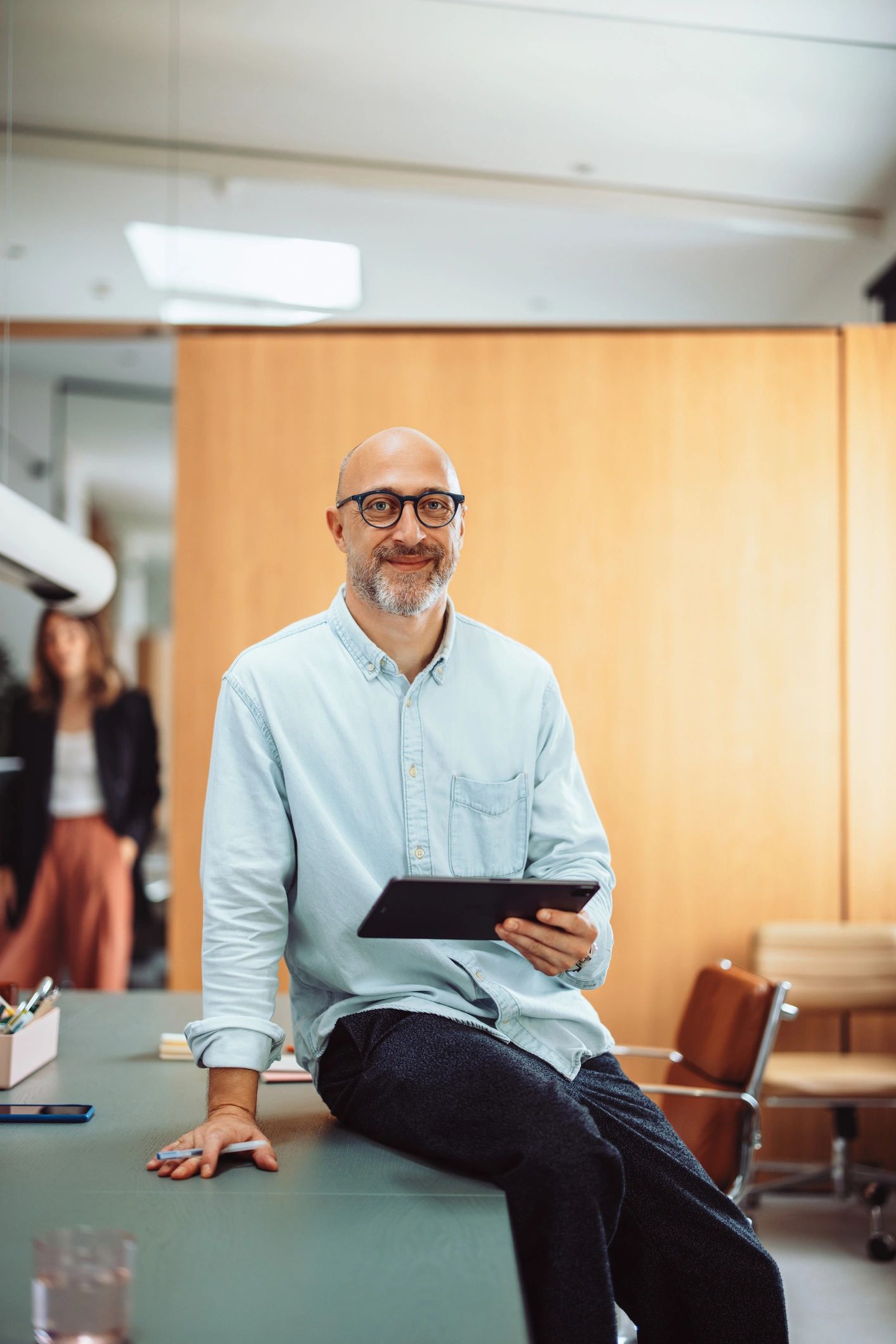 Portrait of a confident professional holding a tablet